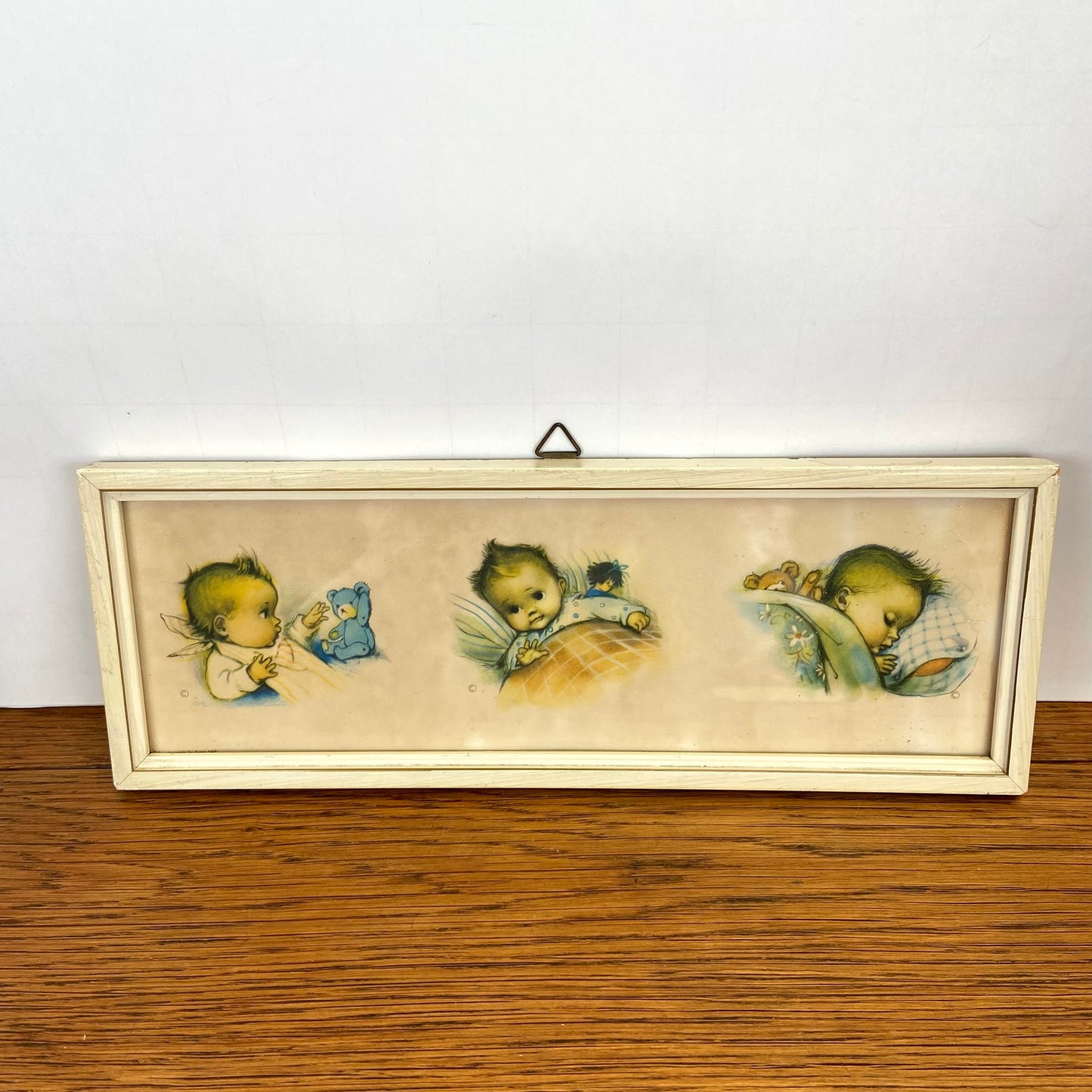 Vintage schilderijtje baby'tjes in bed