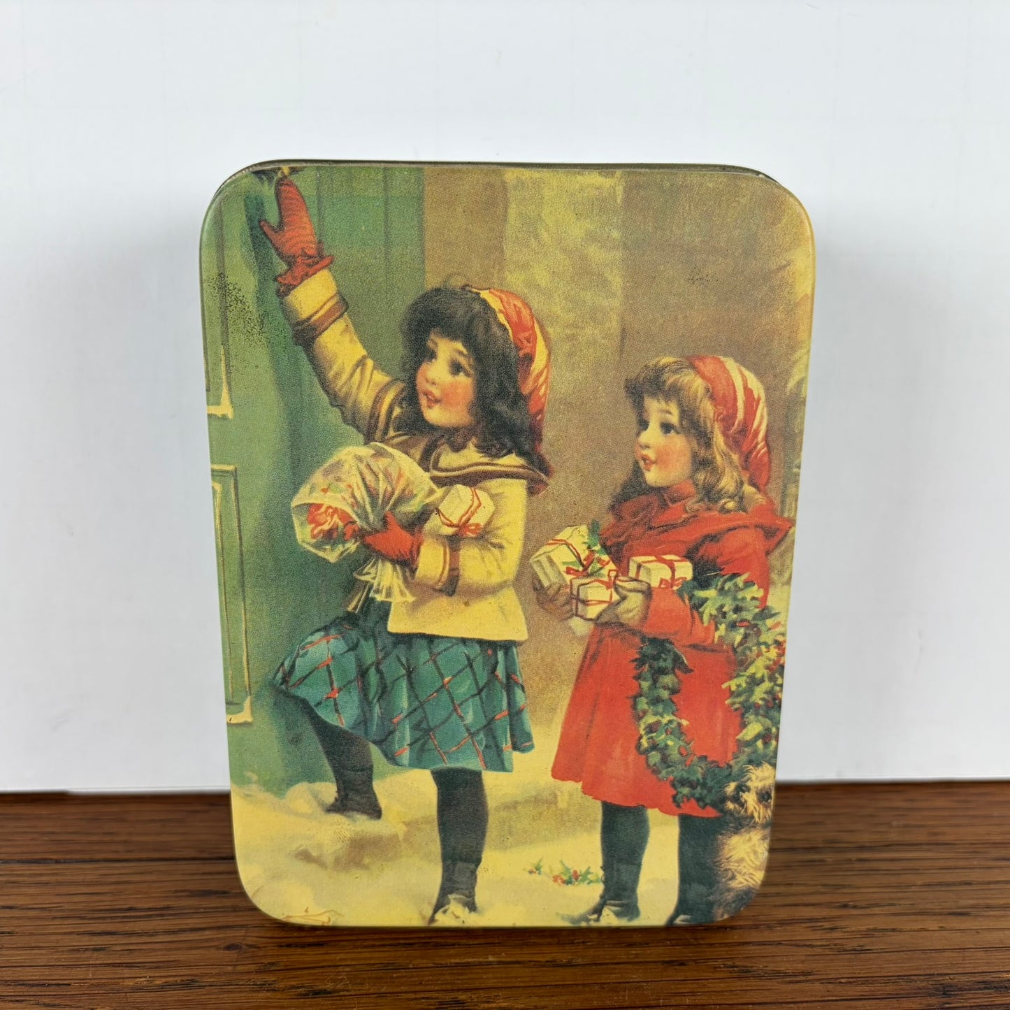 Vintage kerst blikje 2 meisjes