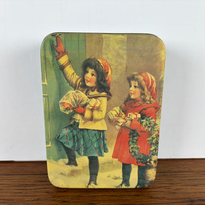 Vintage kerst blikje 2 meisjes