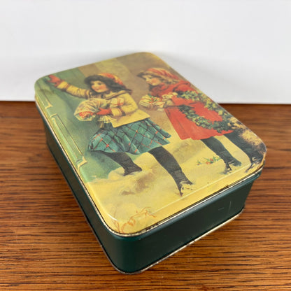 Vintage kerst blikje 2 meisjes