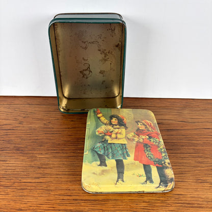 Vintage kerst blikje 2 meisjes