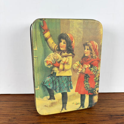 Vintage kerst blikje 2 meisjes