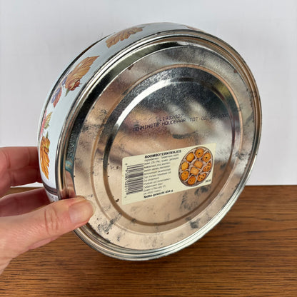 Ronde koekjestrommel schaatsen