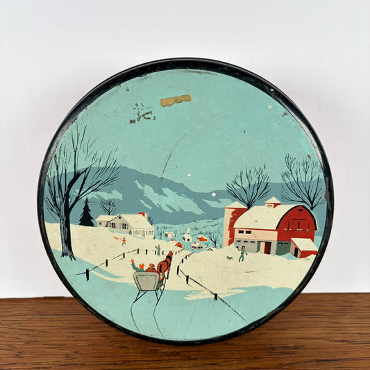 Vintage rond koekjes blik sneeuw