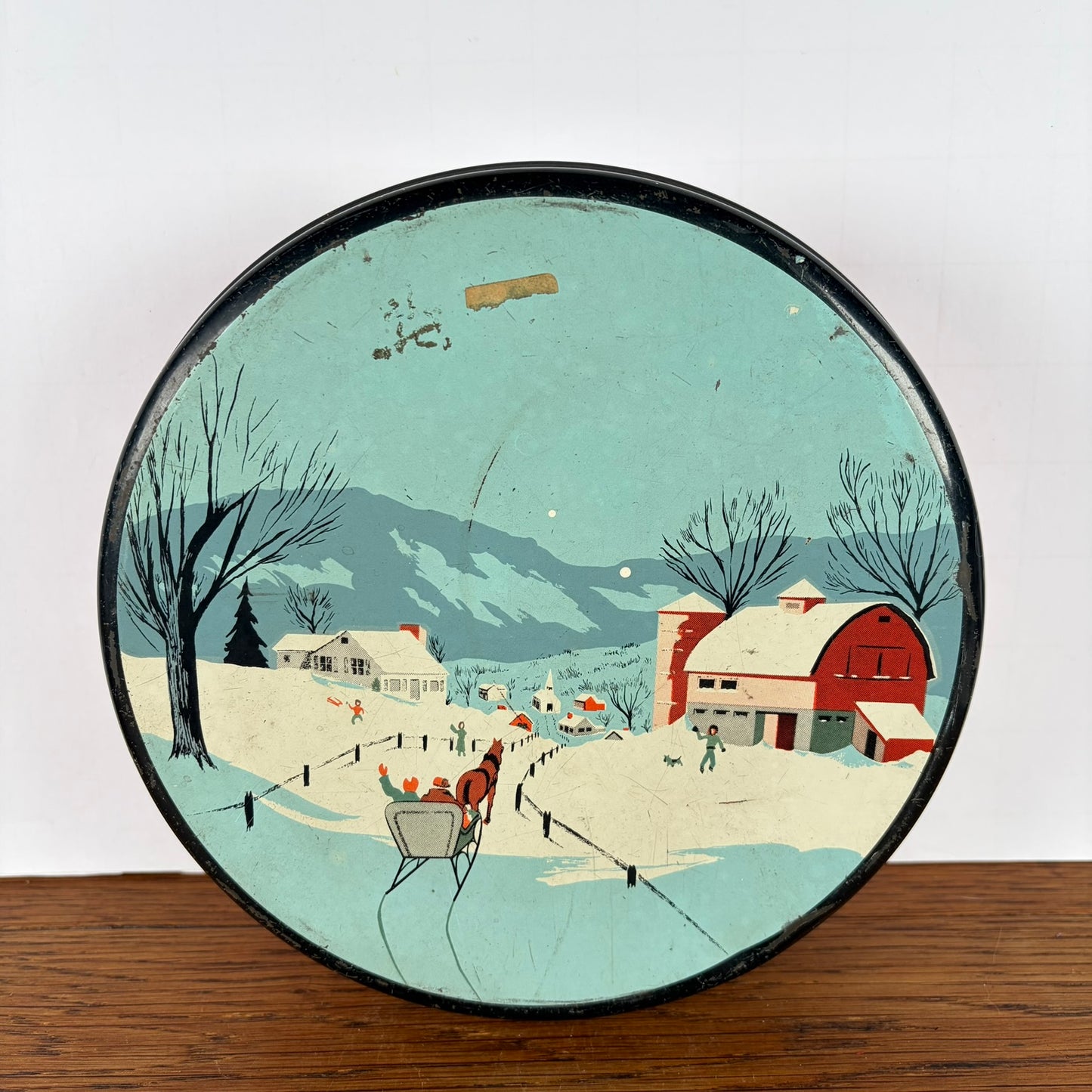 Vintage rond koekjes blik sneeuw