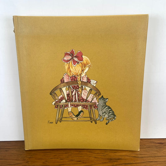 Vintage fotoalbum meisje met kat