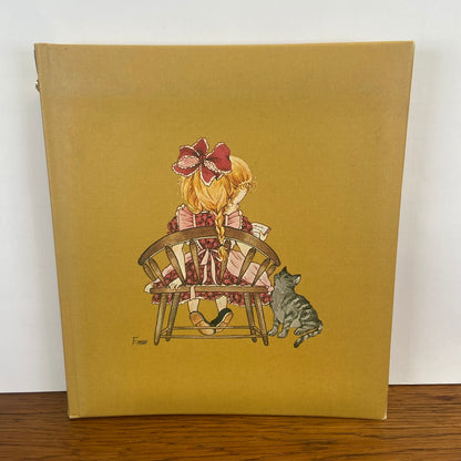 Vintage fotoalbum meisje met kat