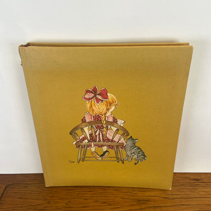 Vintage fotoalbum meisje met kat
