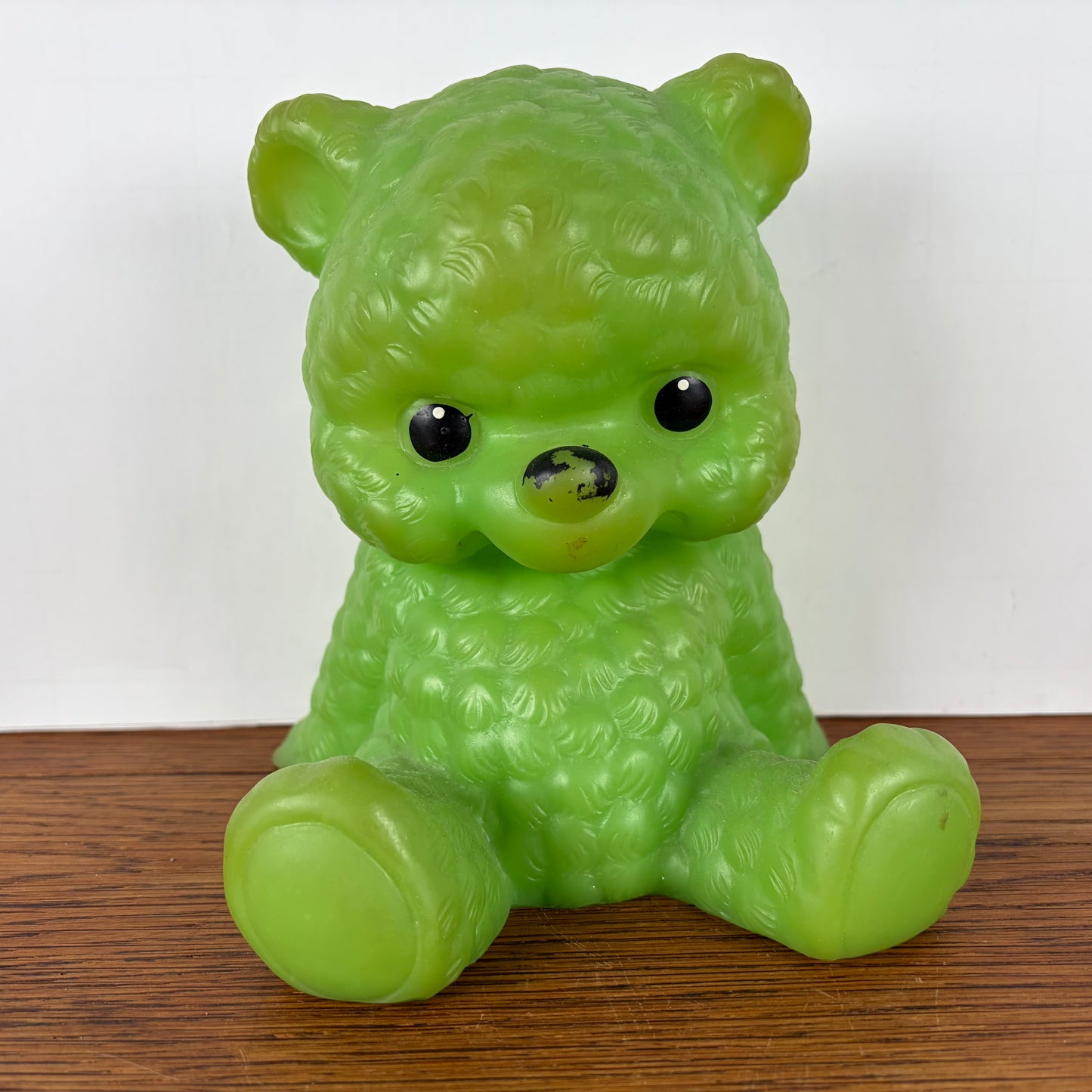 Vintage groen piepbeest beer