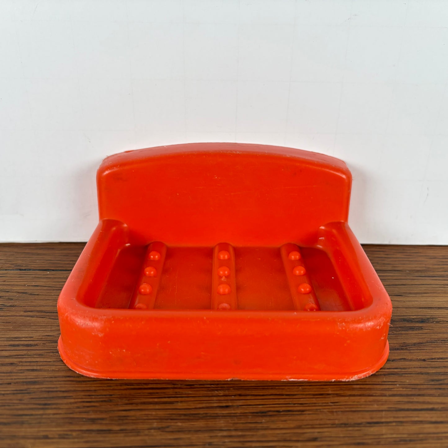 Vintage oranje zeepbakje