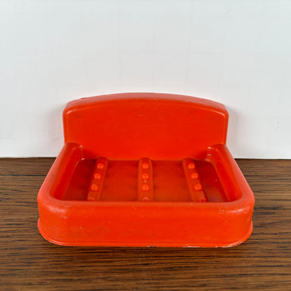 Vintage oranje zeepbakje