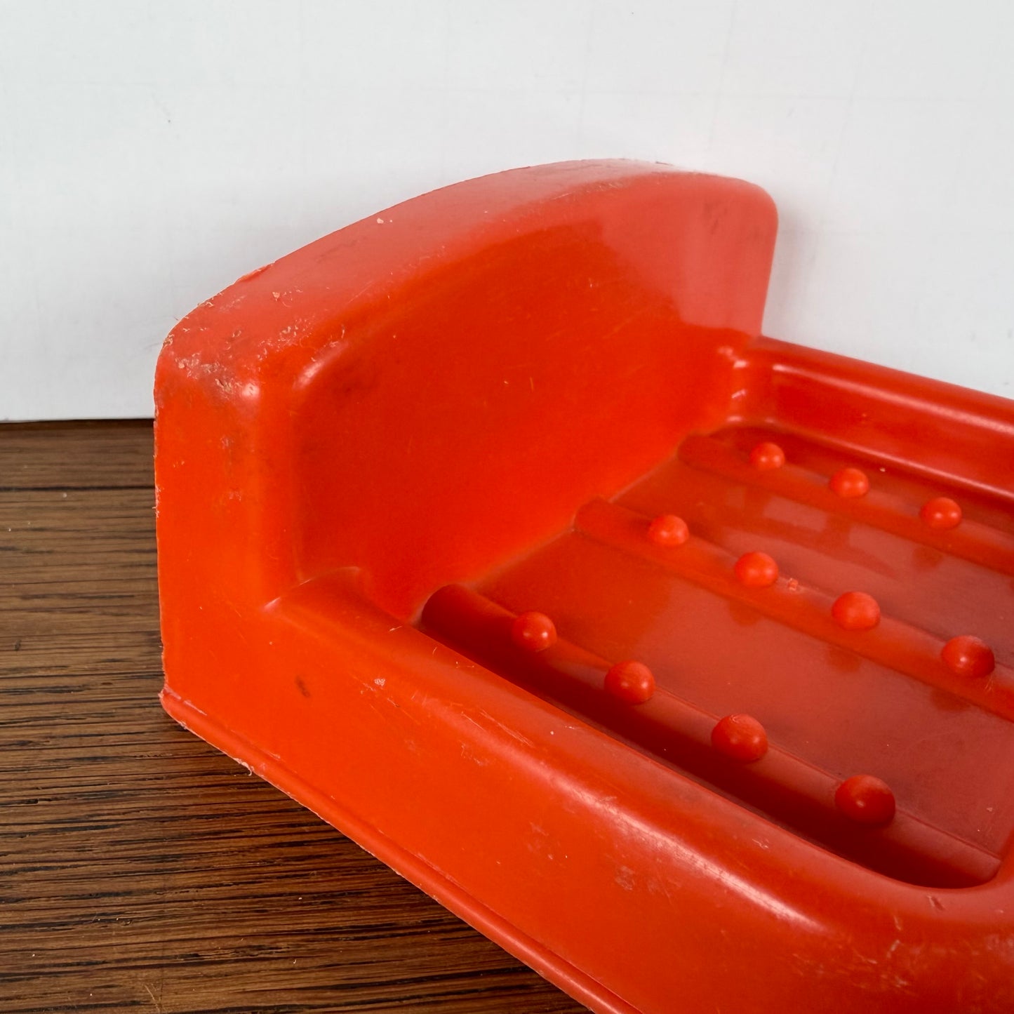 Vintage oranje zeepbakje