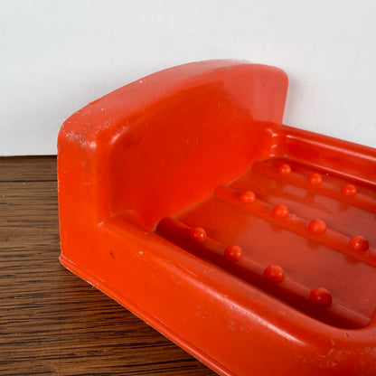 Vintage oranje zeepbakje