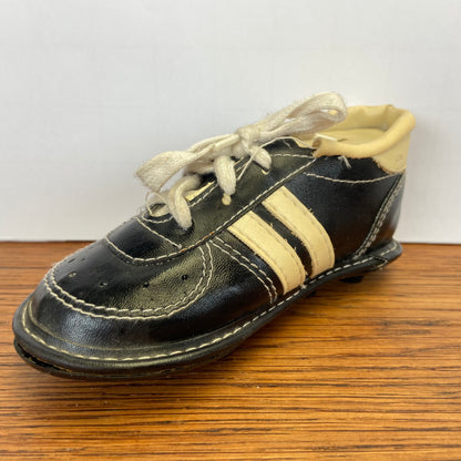 Vintage spaarpot voetbalschoen