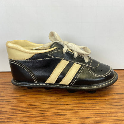 Vintage spaarpot voetbalschoen