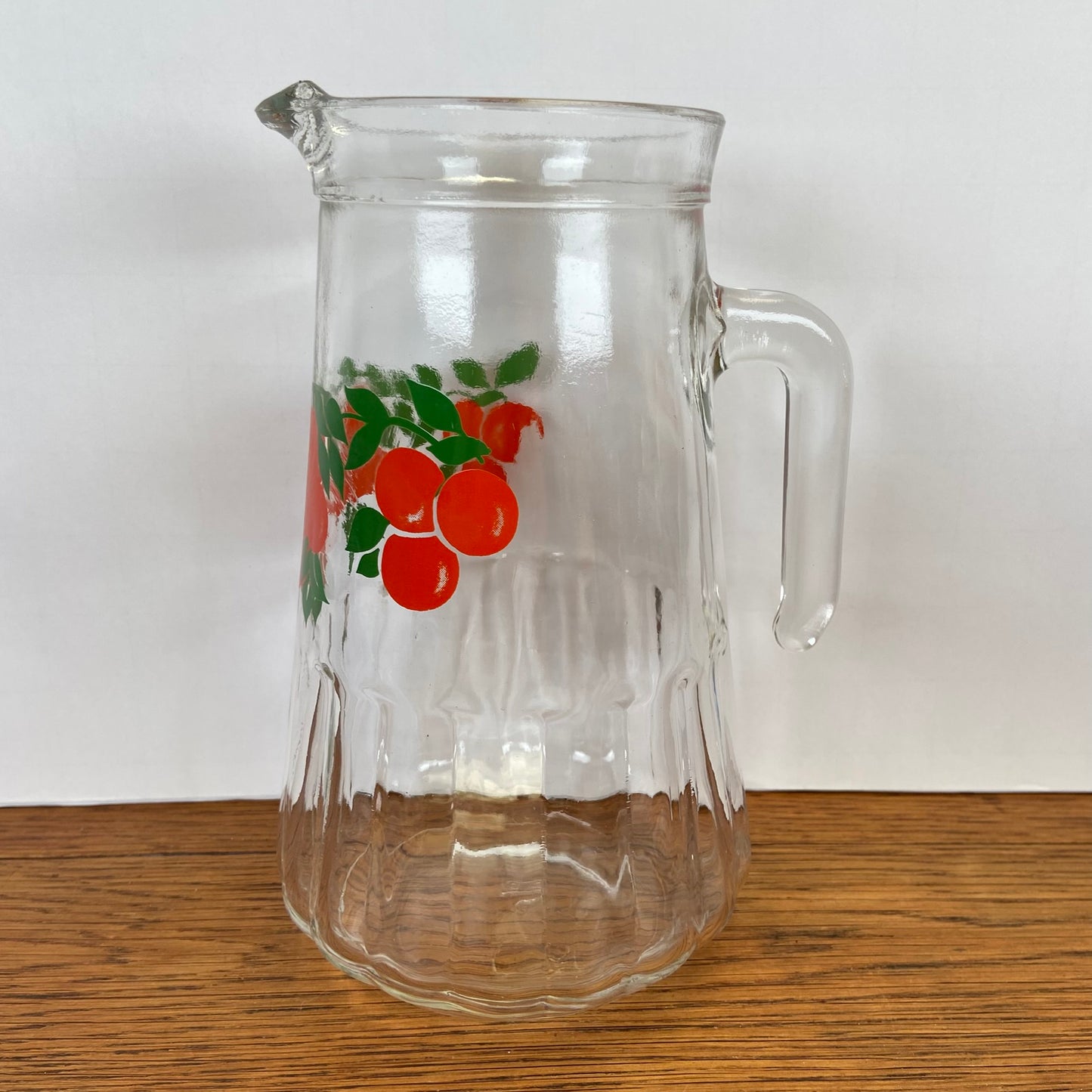 Vintage waterkan sinaasappels