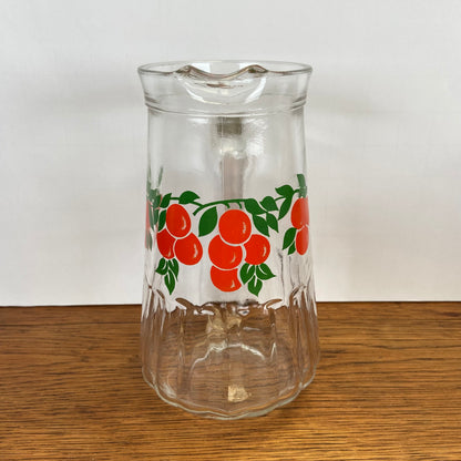 Vintage waterkan sinaasappels