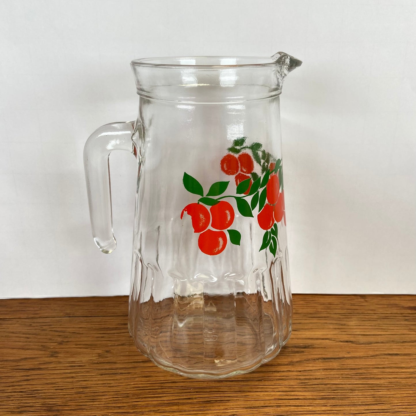 Vintage waterkan sinaasappels