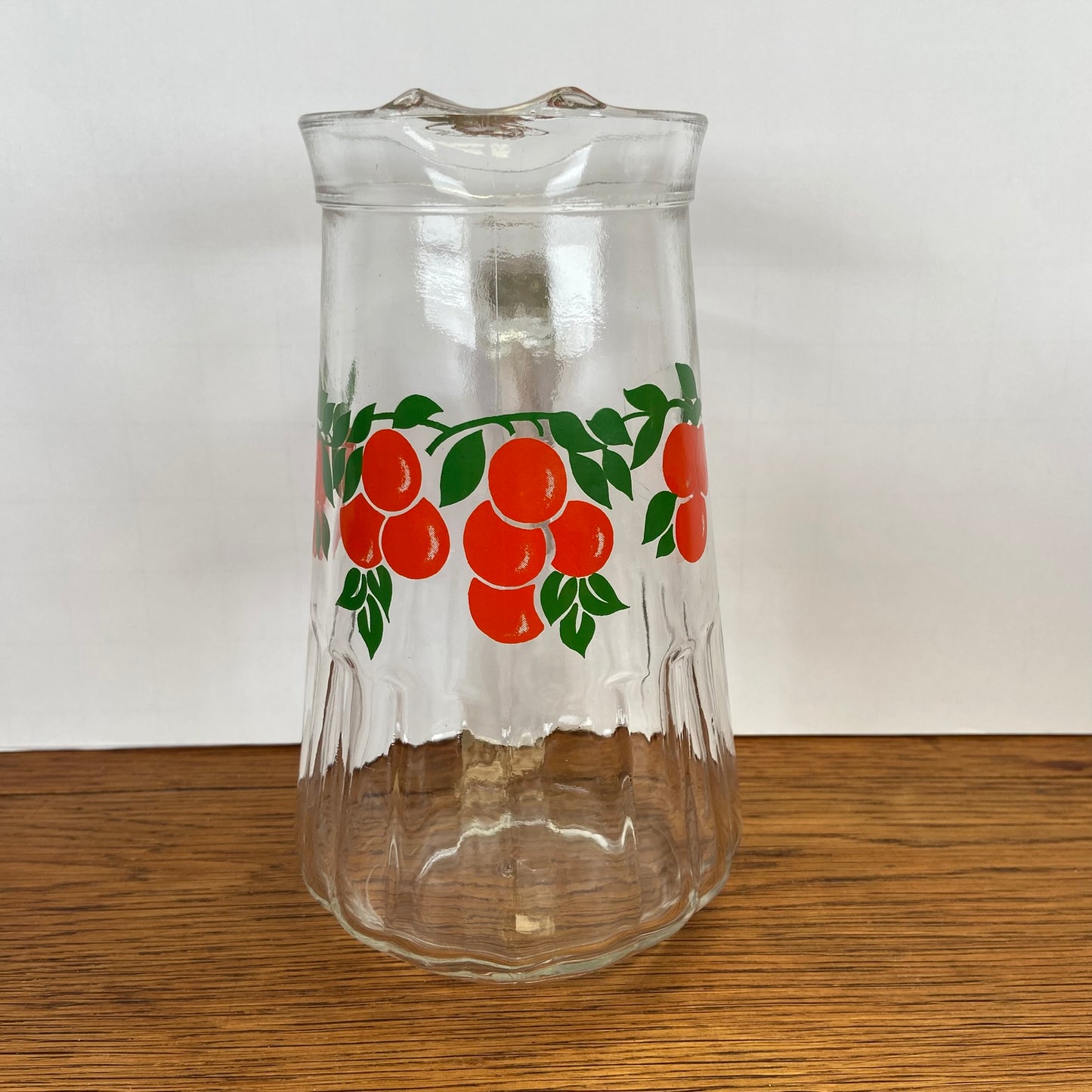 Vintage waterkan sinaasappels