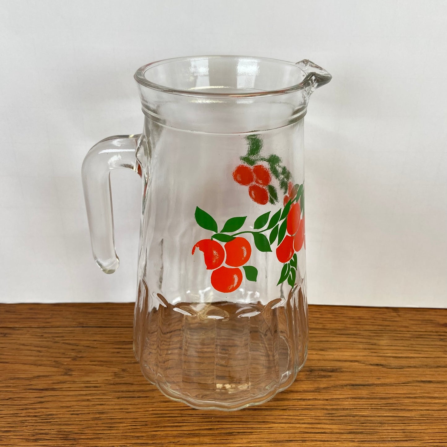 Vintage waterkan sinaasappels