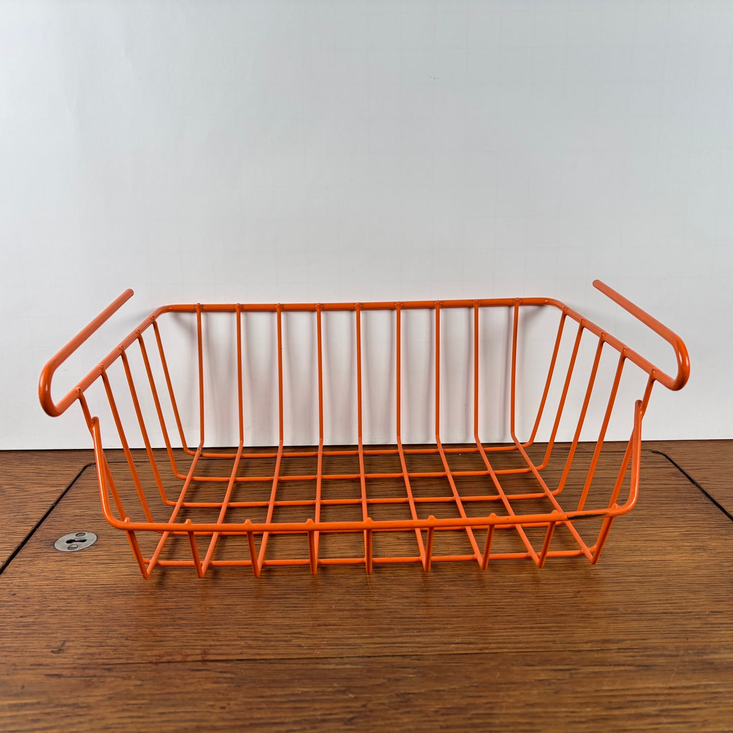 Vintage plastic draadmandje oranje