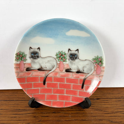 Vintage bordje 2 katten op muur