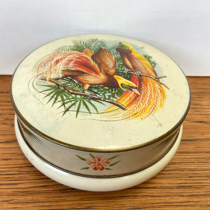 Vintage blikje paradijsvogels rond