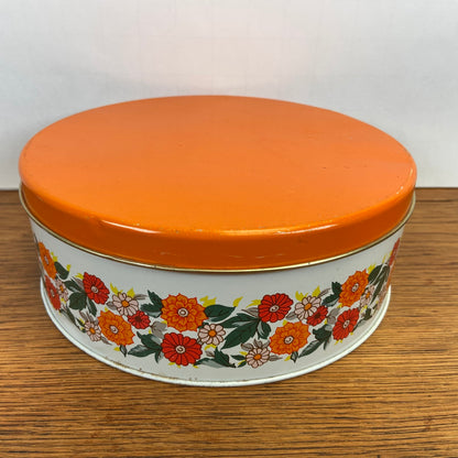 Vintage rond koekjesblik oranje