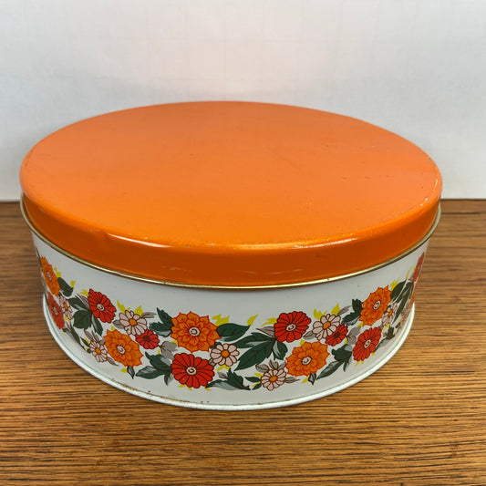 Vintage rond koekjesblik oranje