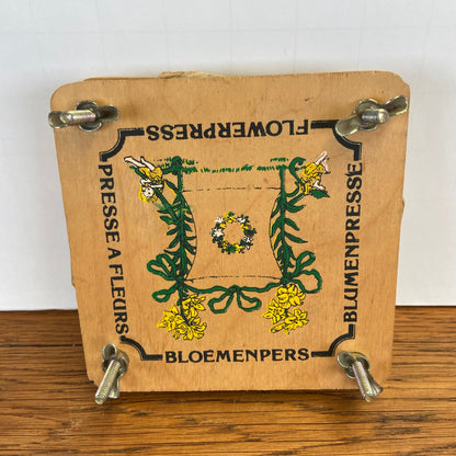 Vintage bloemenpers