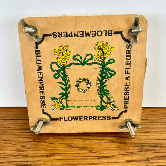 Vintage bloemenpers