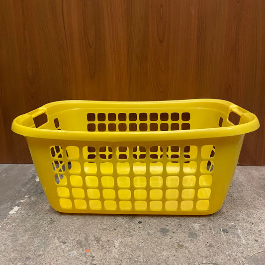 Grote vintage gele wasmand