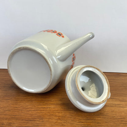 Vintage theepot oranje bloemen