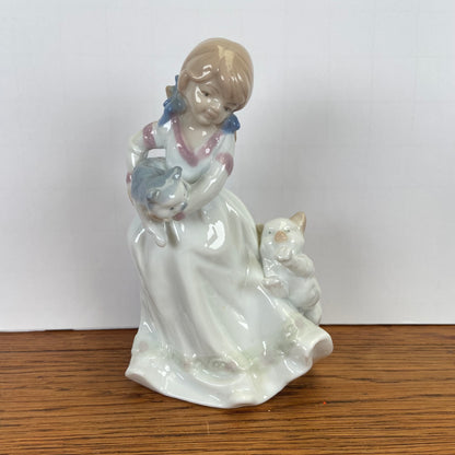 Vintage beeld meisje met katten