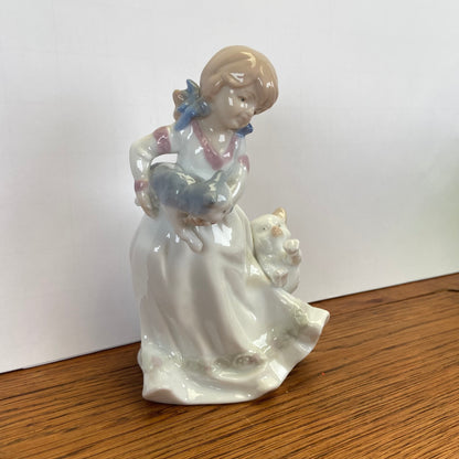 Vintage beeld meisje met katten