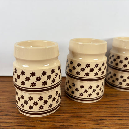 Vintage eierdopjes creme bruine bloem
