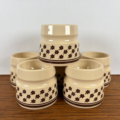 Vintage eierdopjes creme bruine bloem