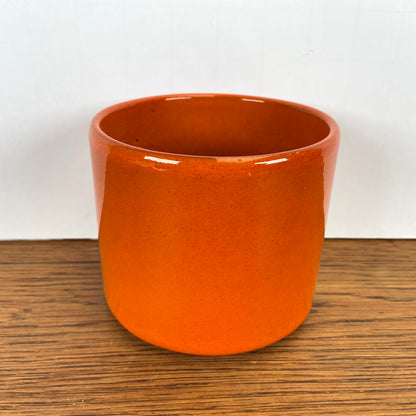 Vintage oranje bloempotje