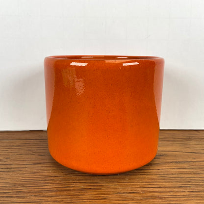 Vintage oranje bloempotje