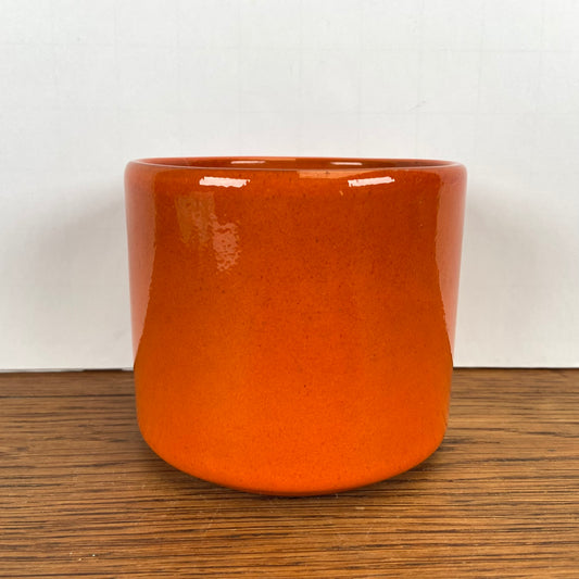 Vintage oranje bloempotje