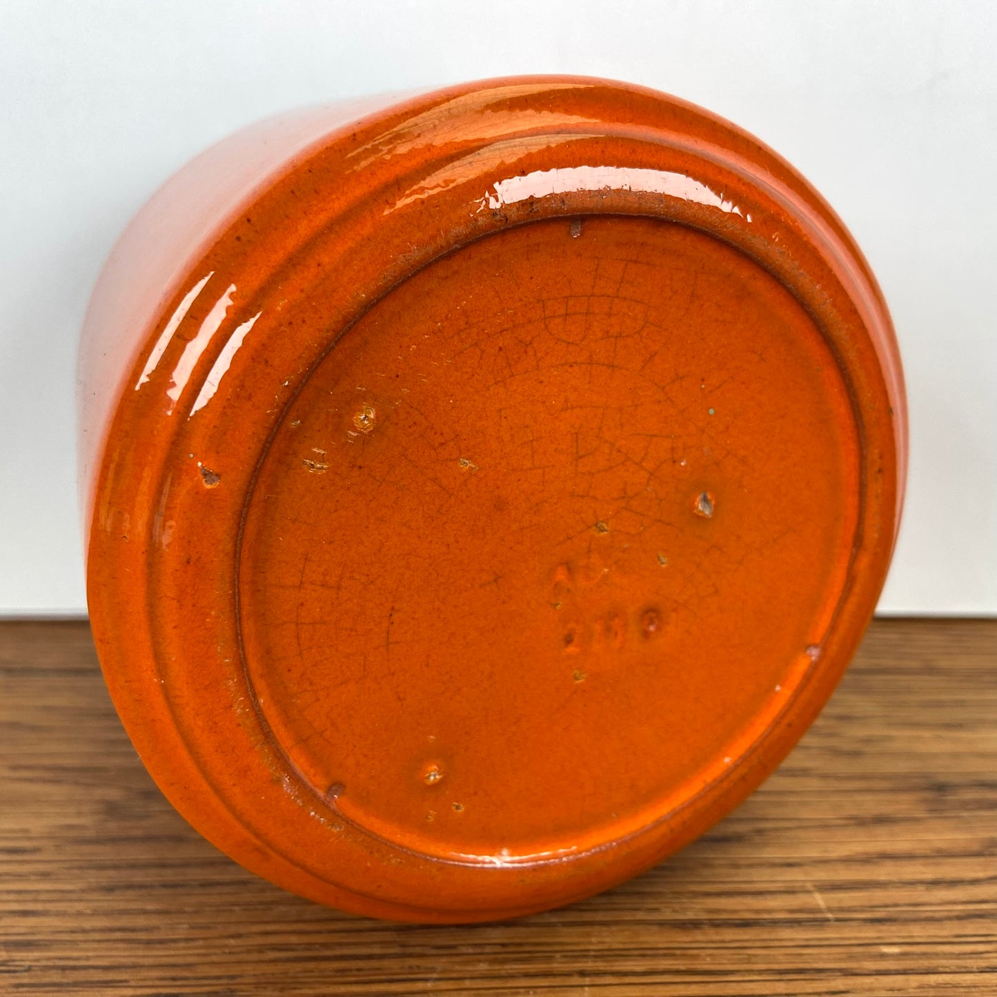 Vintage oranje bloempotje