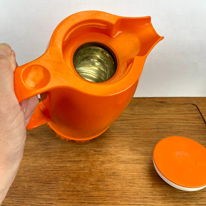 Vintage thermoskan oranje
