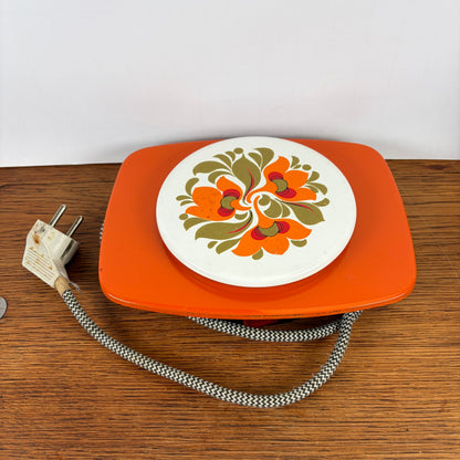 Vintage oranje warmhoud plaatje
