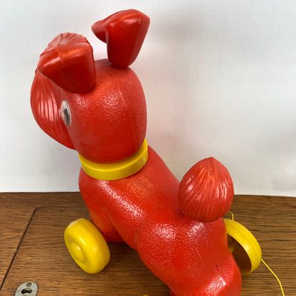 Vintage plastic speelgoed trek hond