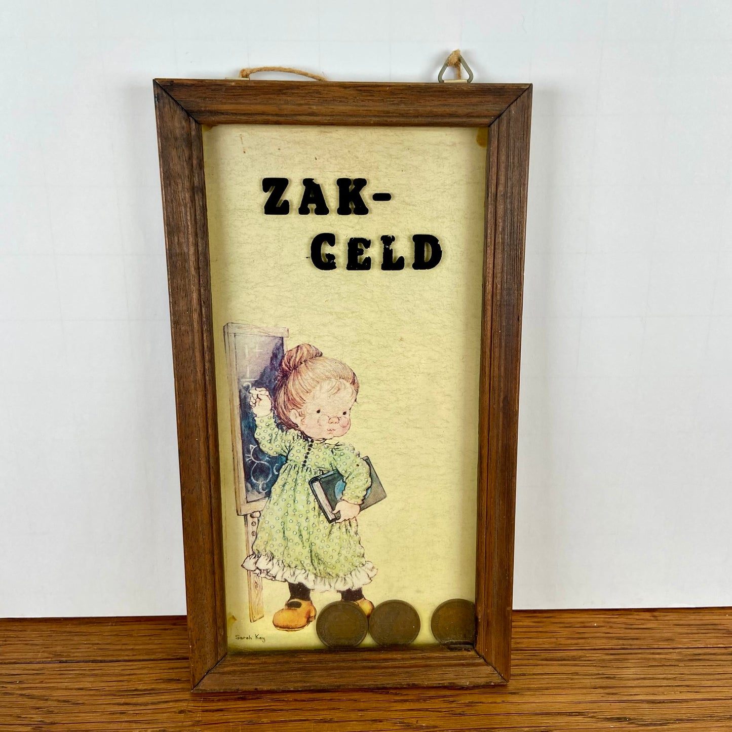 Sarah Kay zakgeld spaarpot