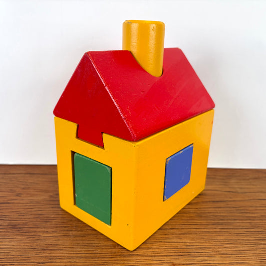 Houten blokken puzzel huisje