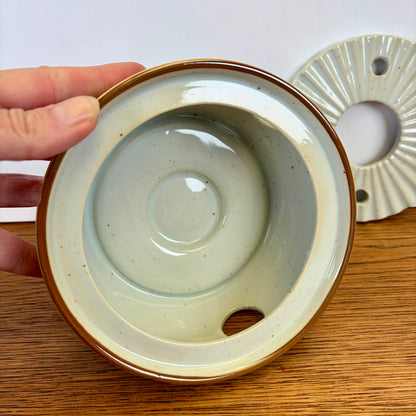 Vintage theepot met theelicht wilde bloemen