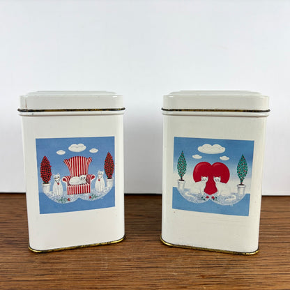 Vintage witte blikjes katten