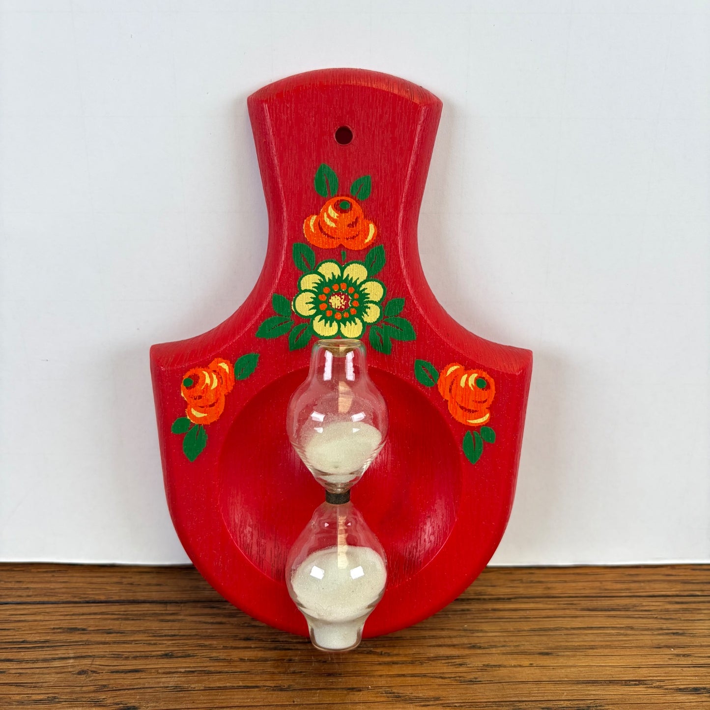 Vintage zandloper rood met bloemen