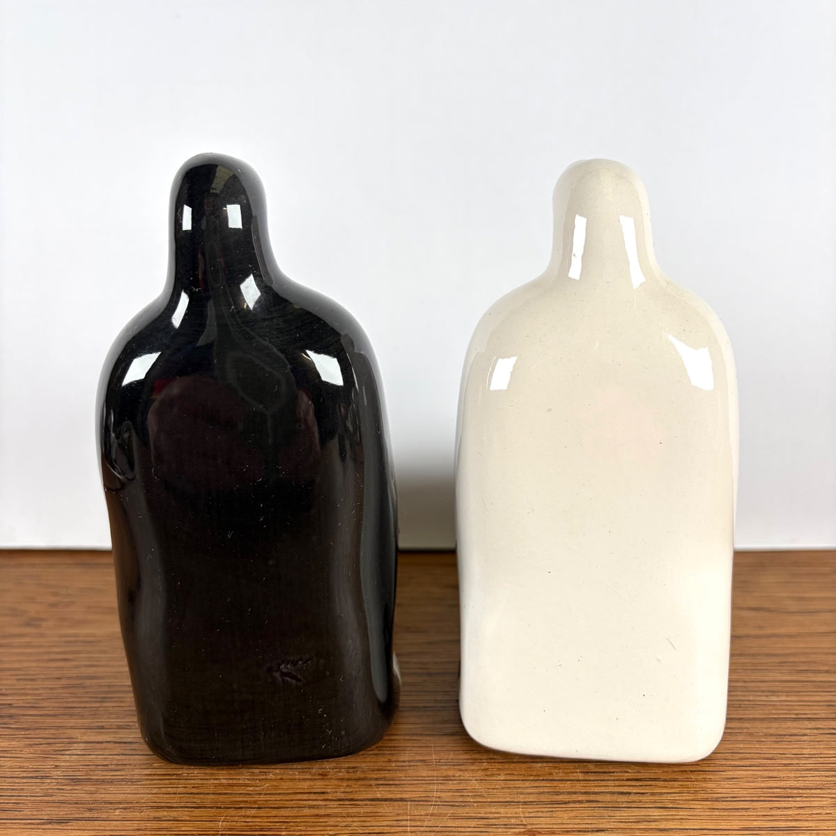 Vintage keramieke boekensteunen katten zwart en wit
